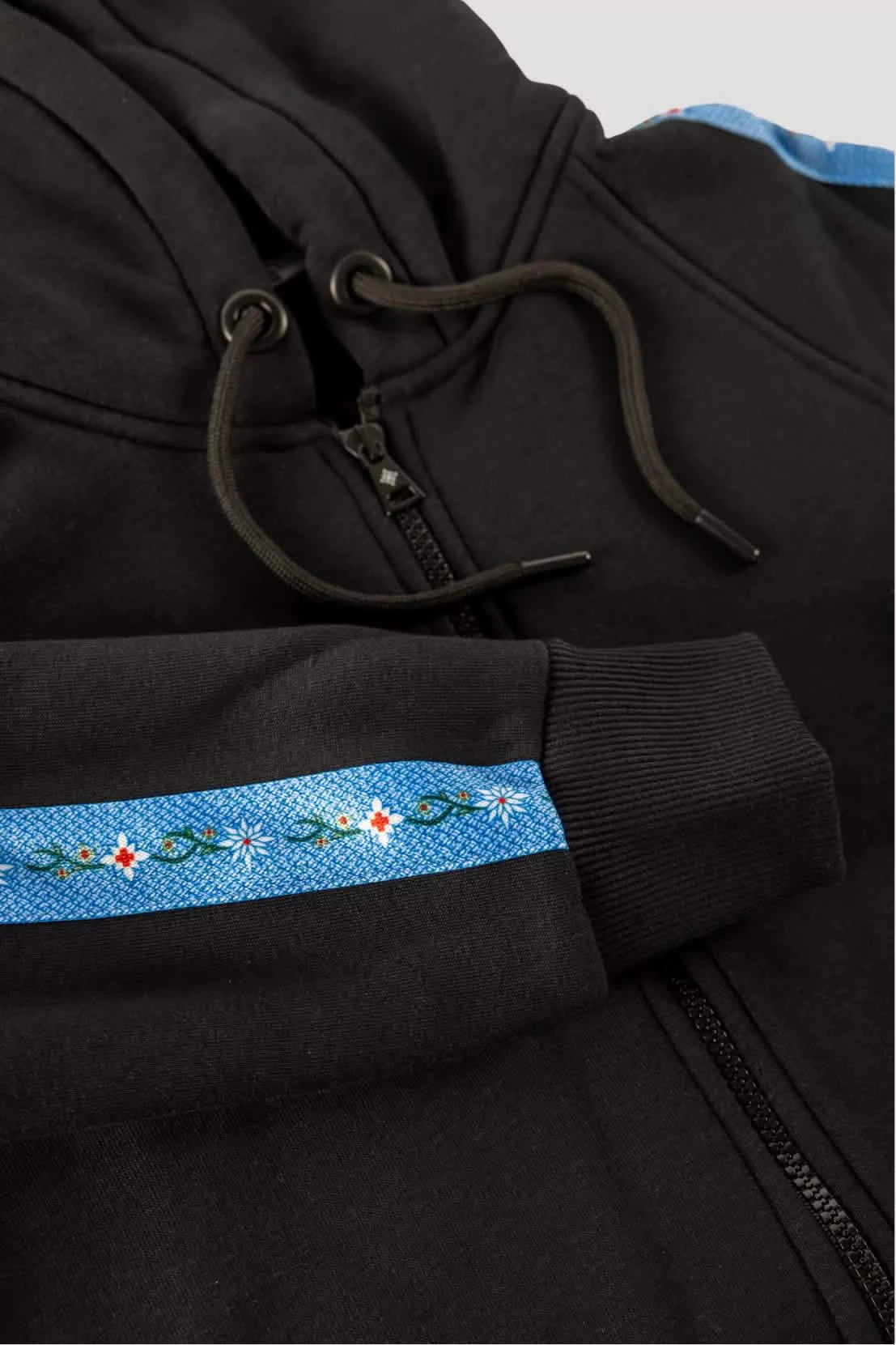 Damen-Sweatjacke mit Edelweiss-Muster, Kapuze und Taschen.