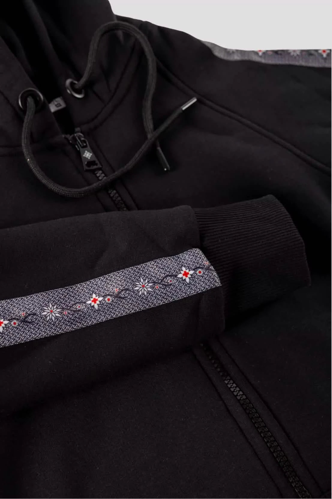 Damen-Sweatjacke mit Edelweiss-Muster, Kapuze und Taschen.