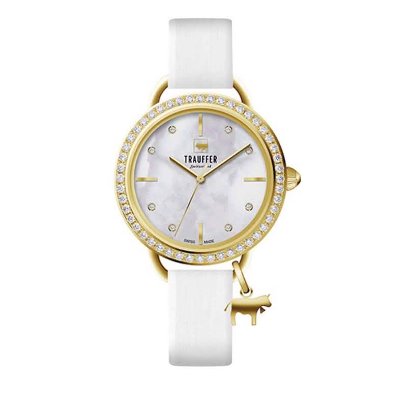Trauffer Damenuhr mit goldfarbenem Gehäuse, weissem Band, Perlmutt-Zifferblatt, Steinlünette und goldfarbenem Kuh-Charm – Swiss Made