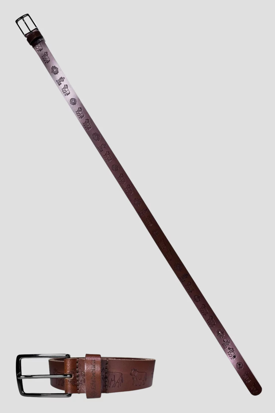 Brauner Appenzeller Ledergürtel von Edelvetica mit geprägten Kuh- und Edelweiss-Motiven, handgefertigt aus echtem Leder in der Schweiz